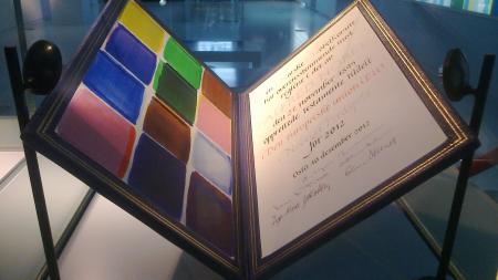 EU Nobel Peace Prize, a large folder with colors on the left and certificate on the right