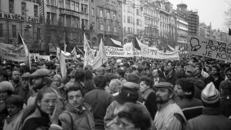Black and white image of protestors with banners