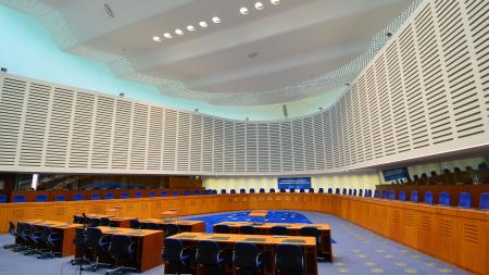 Image of courtroom with blue carpet
