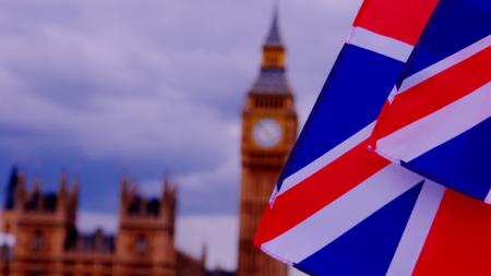 fragment of the Union Jack flag in front of a blurry big ben